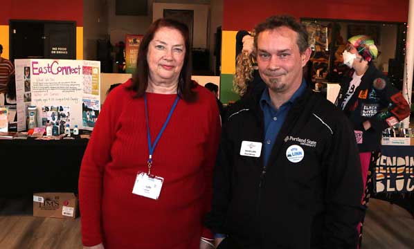 Gayle Palmer of Thrive East PDX spends a moment with Centennial Neighborhood Association Chair David Linn at the fair.